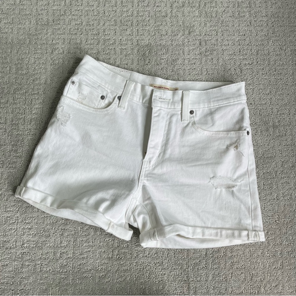 Levi’s White Distressed Denim Shorts